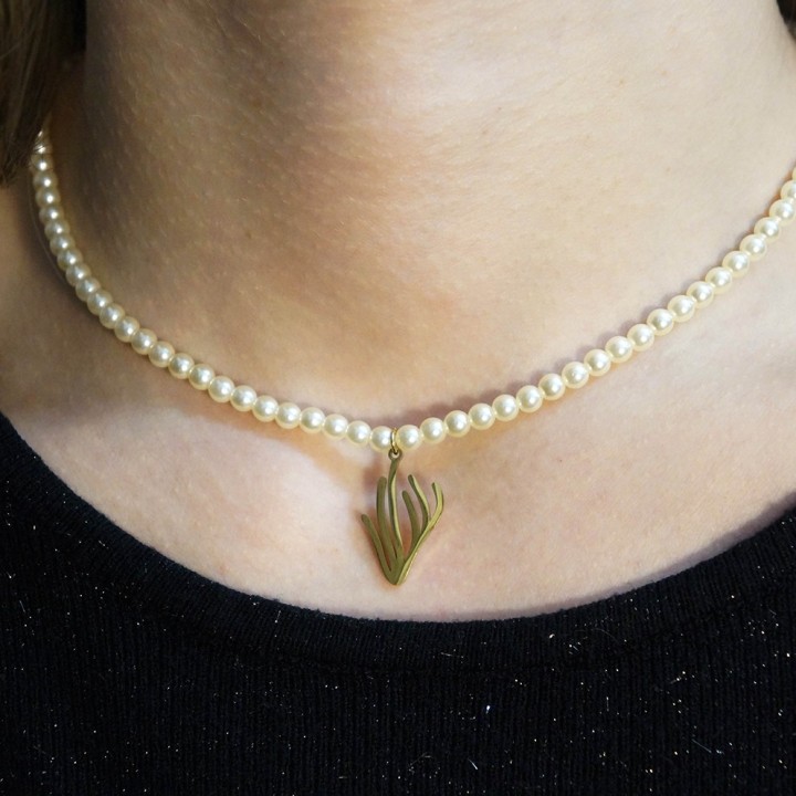 le collier en perles logo