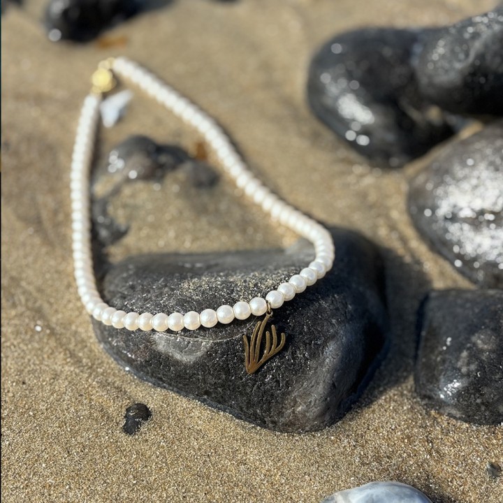 le collier en perles logo