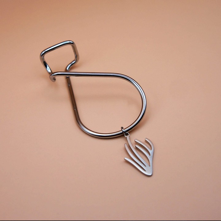 bijou d'oreille argenté le Neomad