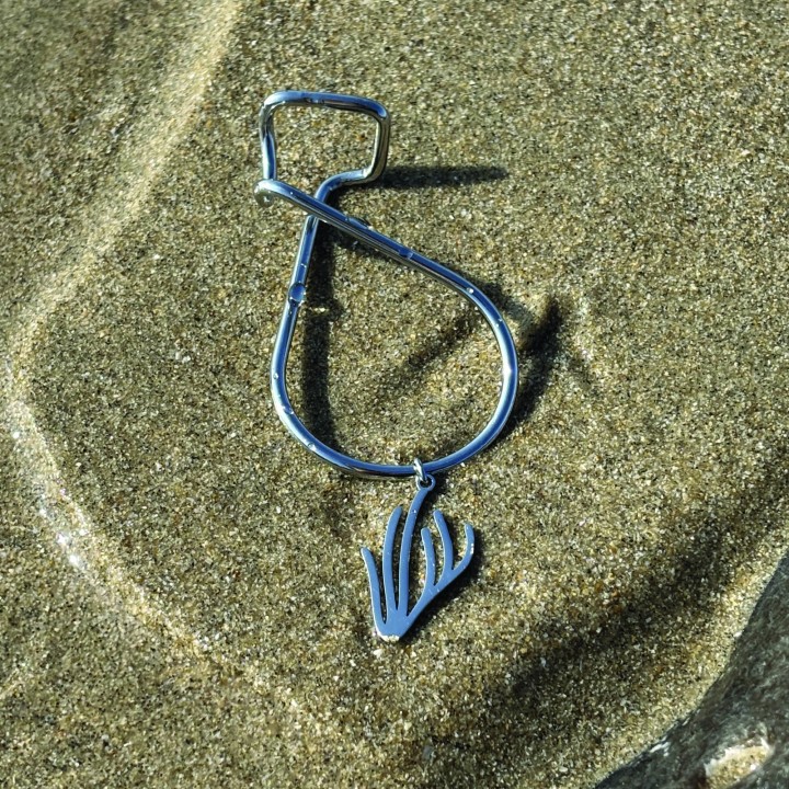 bijou d'oreille argenté le Neomad